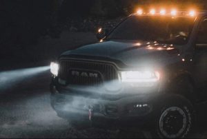 RAM truck driving at night near Anderson, IN