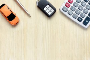 A calculator on a table, being used at a car dealership near Anderson, Indiana.