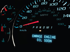 An oil change alert on the dashboard of a vehicle near Anderson, Indiana.