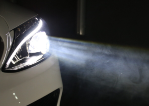 A car's healights shining at nighttime near Anderson, Indiana.