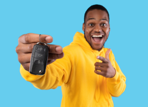 A person showing a pair of car keys after shopping near Anderson, Indiana