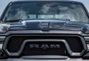 An extreme close-up photo of the grill of a 2024 Ram 1500 near Anderson, Indiana