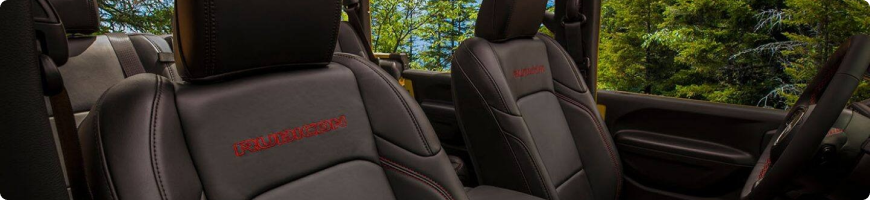 2026 Jeep Gladiator interior seating five with a 60/40 split folding rear bench