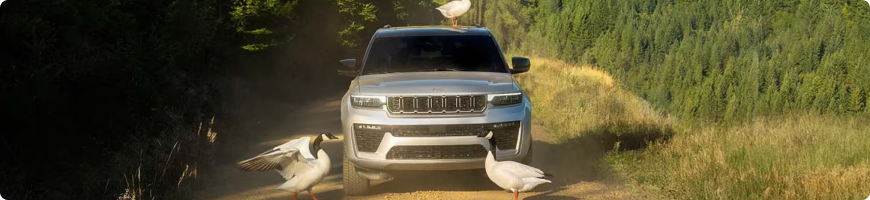 2026 Jeep Grand Cherokee L towing a camper, rated up to 6,200 lbs