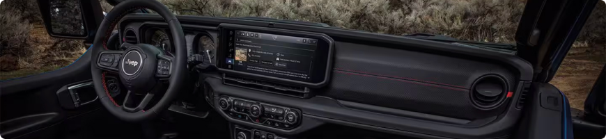 2026 Jeep Wrangler interior with 12.3-inch Uconnect 5 touchscreen