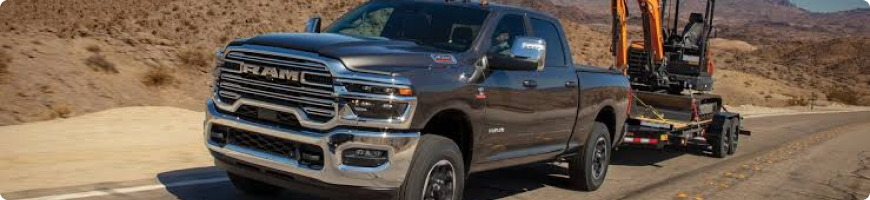 2026 RAM 2500 towing a gooseneck trailer, rated up to 20,000 lbs