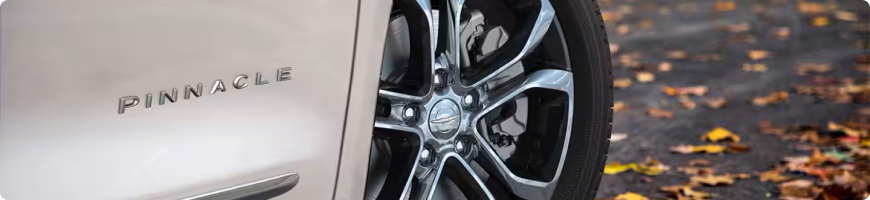 2027 Chrysler Pacifica refreshed front fascia with illuminated grille and LED headlamps